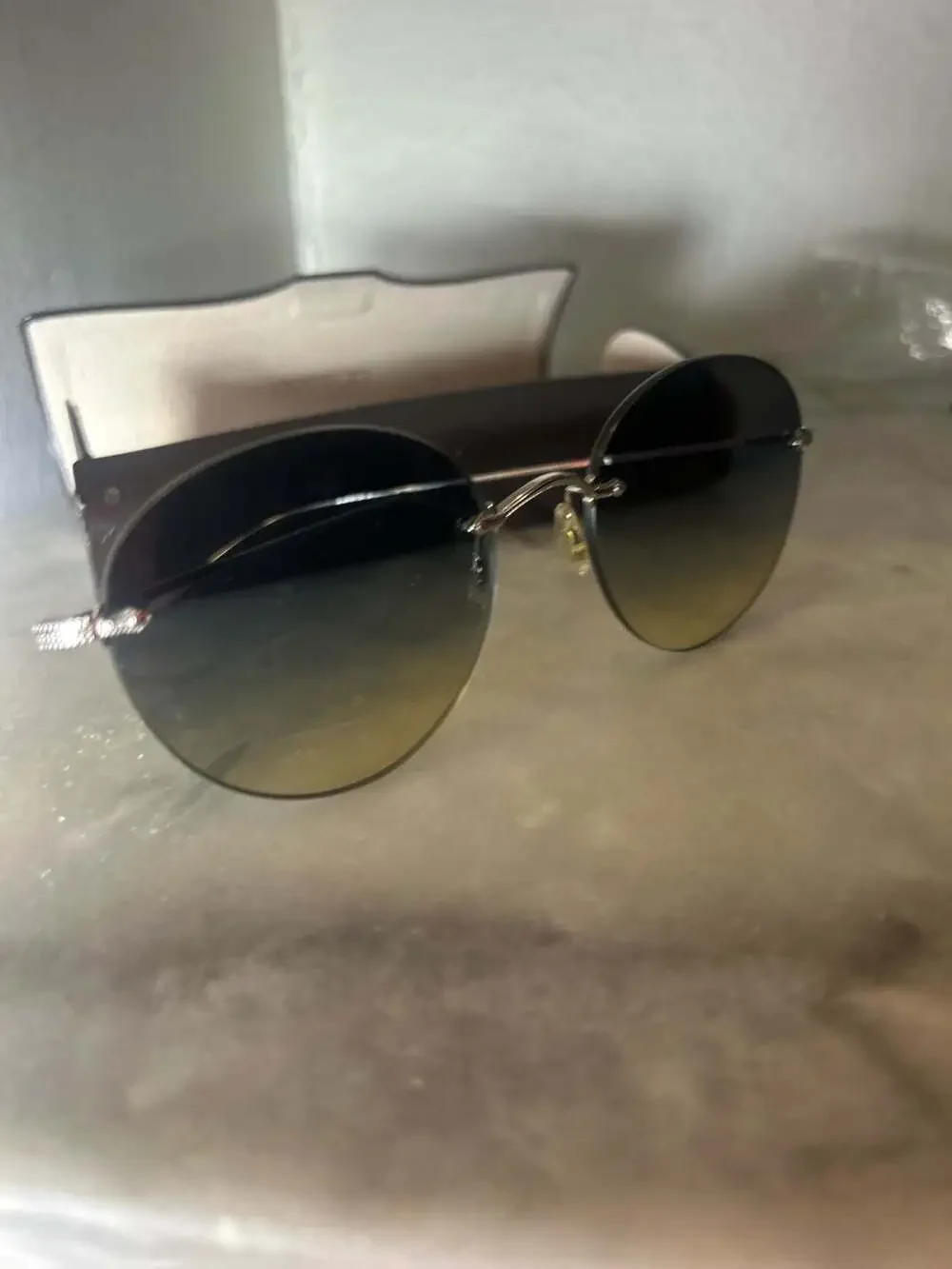 Oliver Peoples Coliena OV1264S Rimless Gradient Sunglasses